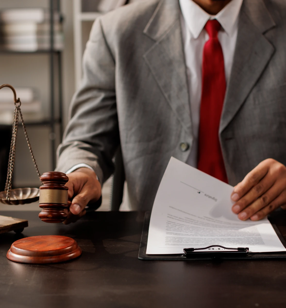 Lawyer with gavel and paperwork
